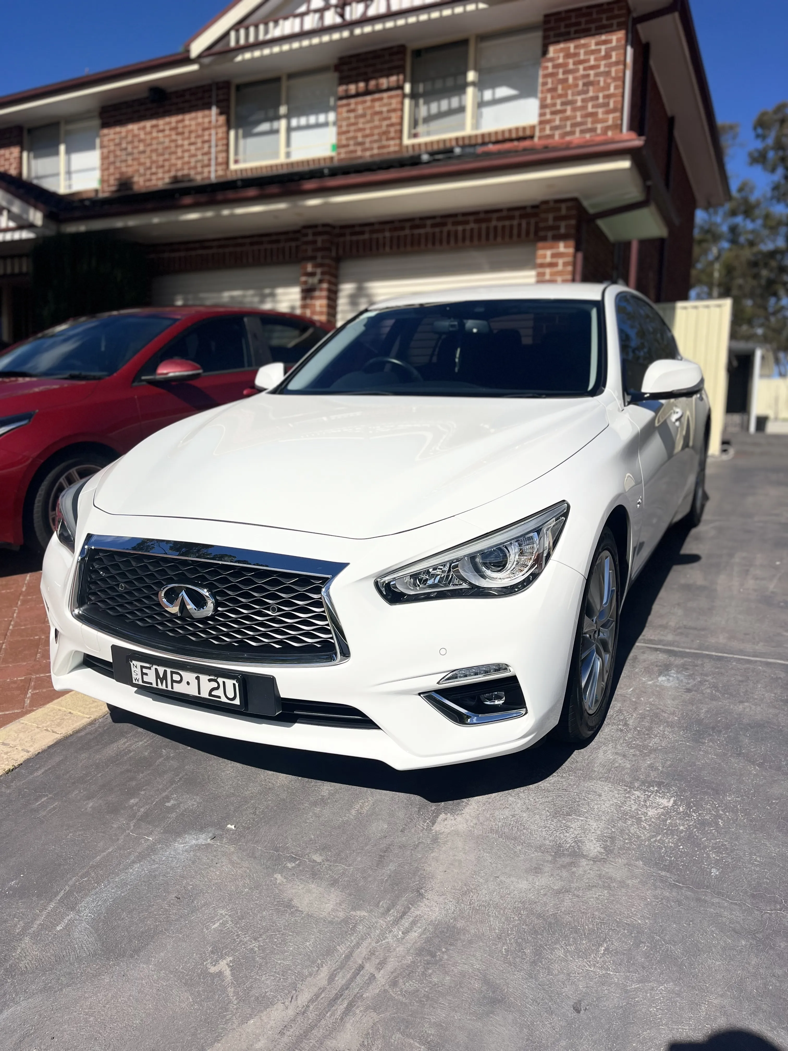 Infiniti Q50 polished front — showroom finish by 3Stage Car Care