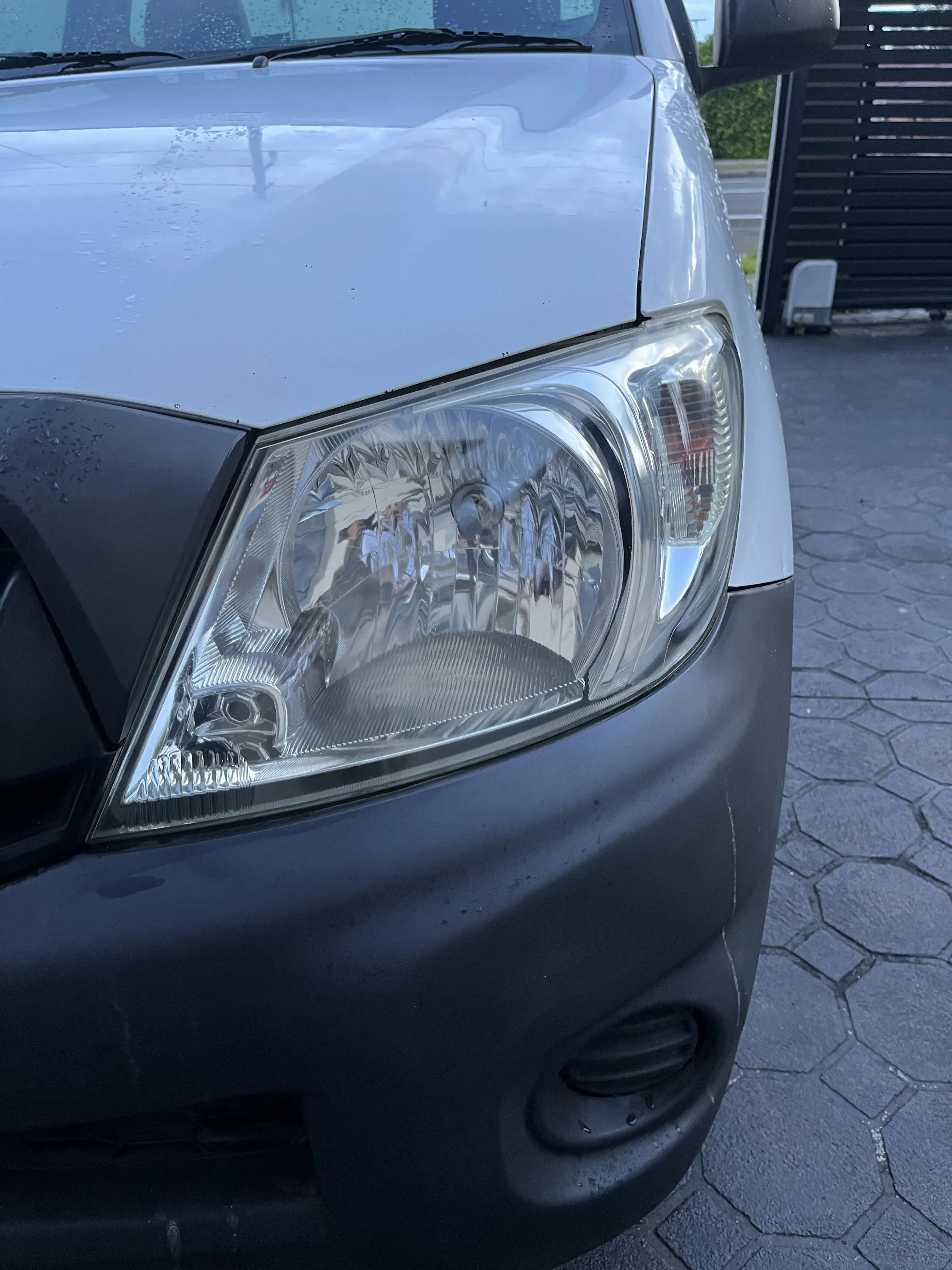Crystal clear headlight after professional restoration by 3Stage Car Care Sydney
